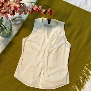 White sleeveless blouse from Ann Taylor. Size 10.